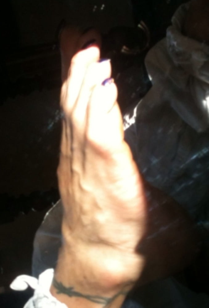 Blue toenails under sun ray #106845625