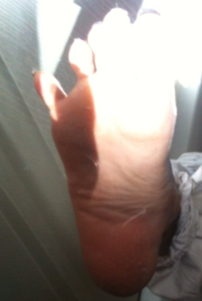 Blue toenails under sun ray #106845666