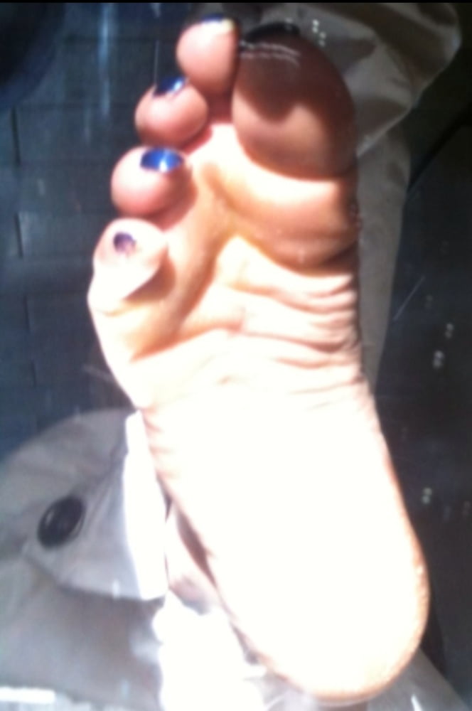 Blue toenails under sun ray #106845669