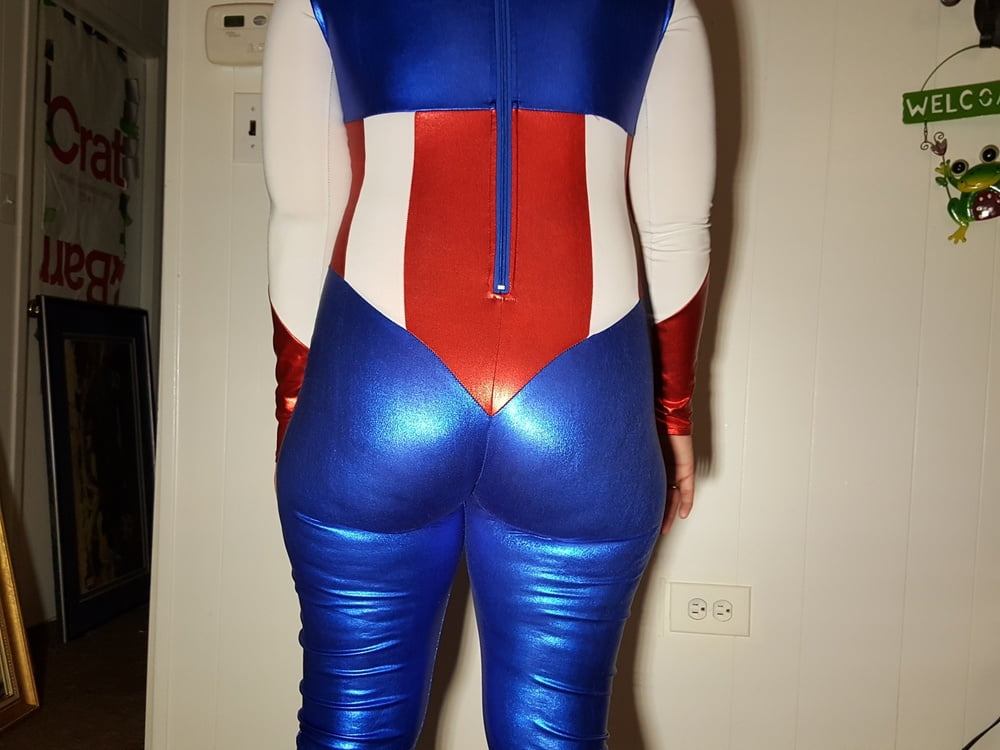 Lexi In A Shiny Spandex Superhero Costume #106971357