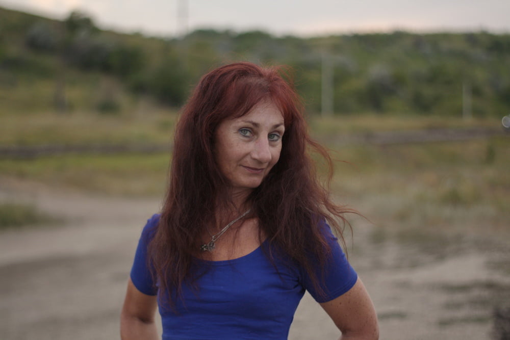 Evening potrait against the background of the river #106607008