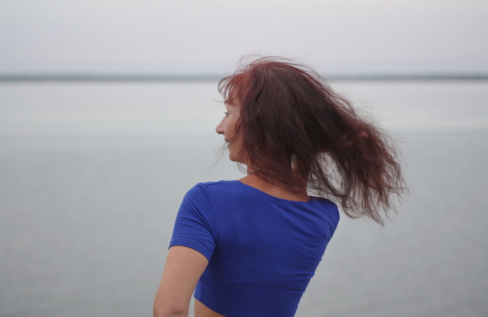 Evening potrait against the background of the river #106607024
