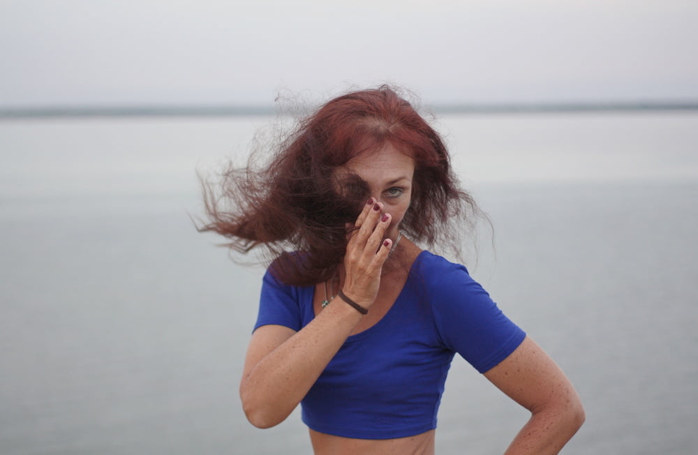Evening potrait against the background of the river #106607029