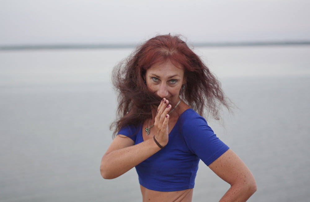 Evening potrait against the background of the river #106607031