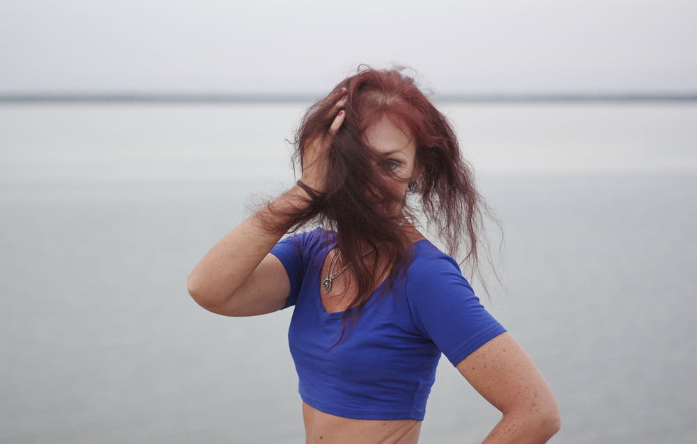 Evening potrait against the background of the river #106607034
