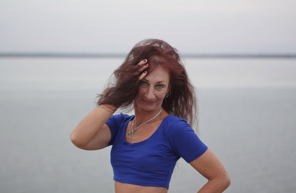 Evening potrait against the background of the river #106607042