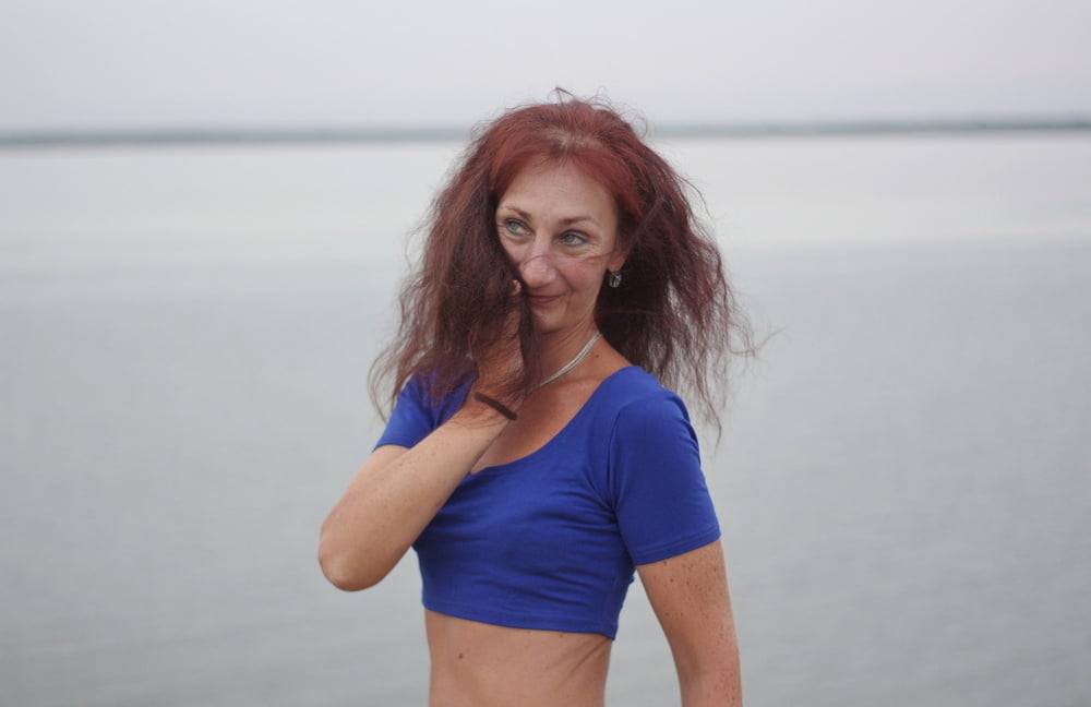 Evening potrait against the background of the river #106607060