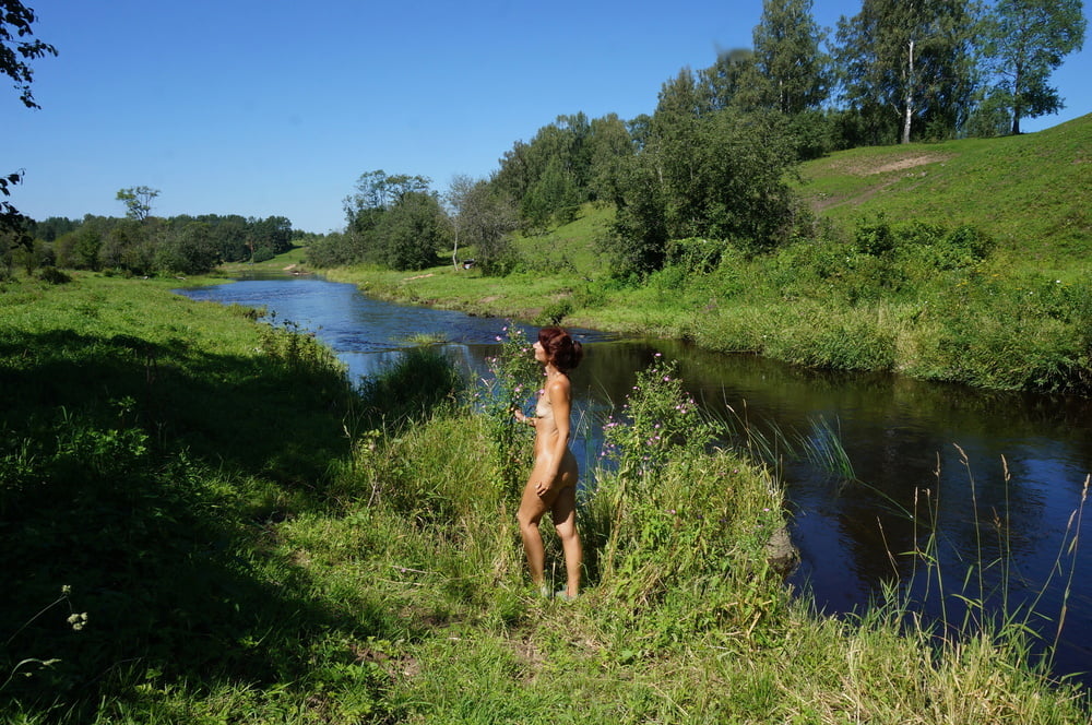 Nude walk upon river #106173811