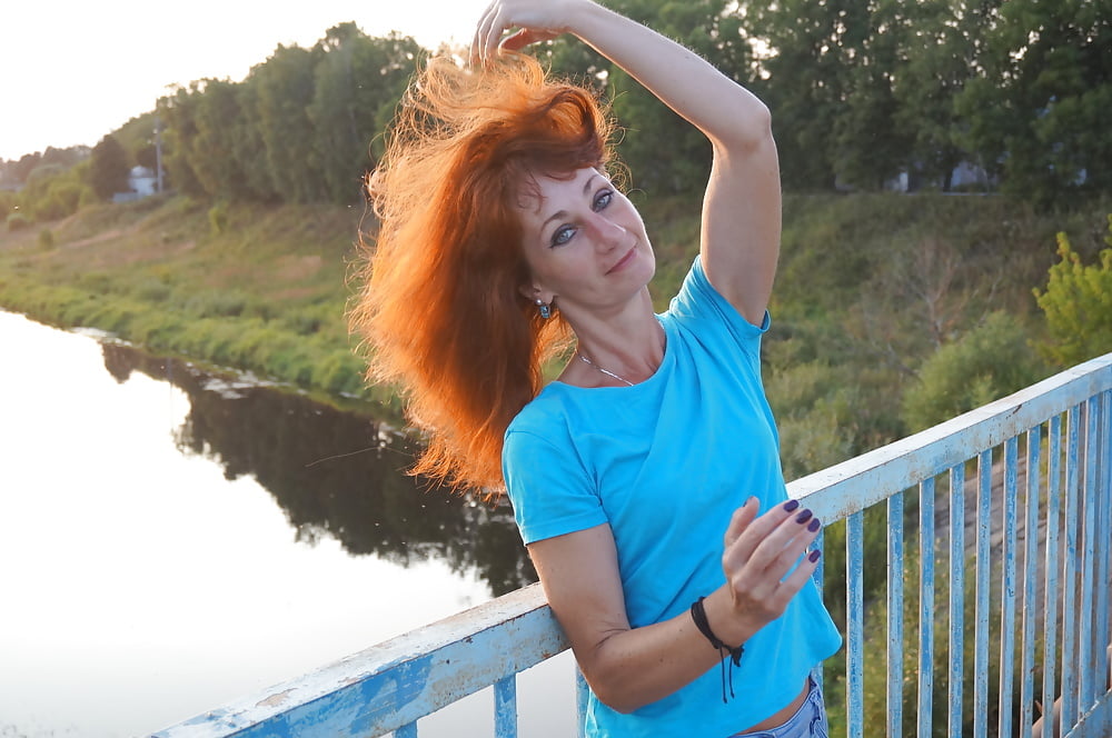 Flamehair in evening on the bridge #107247451