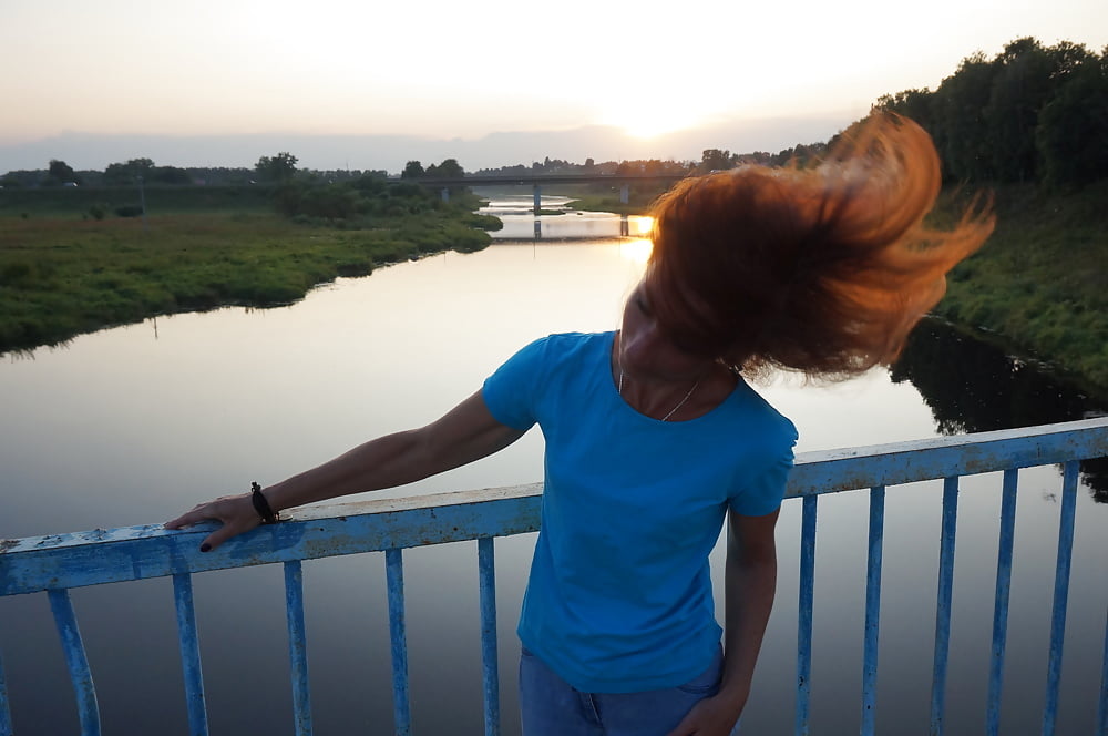 Flamehair in evening on the bridge #107247457