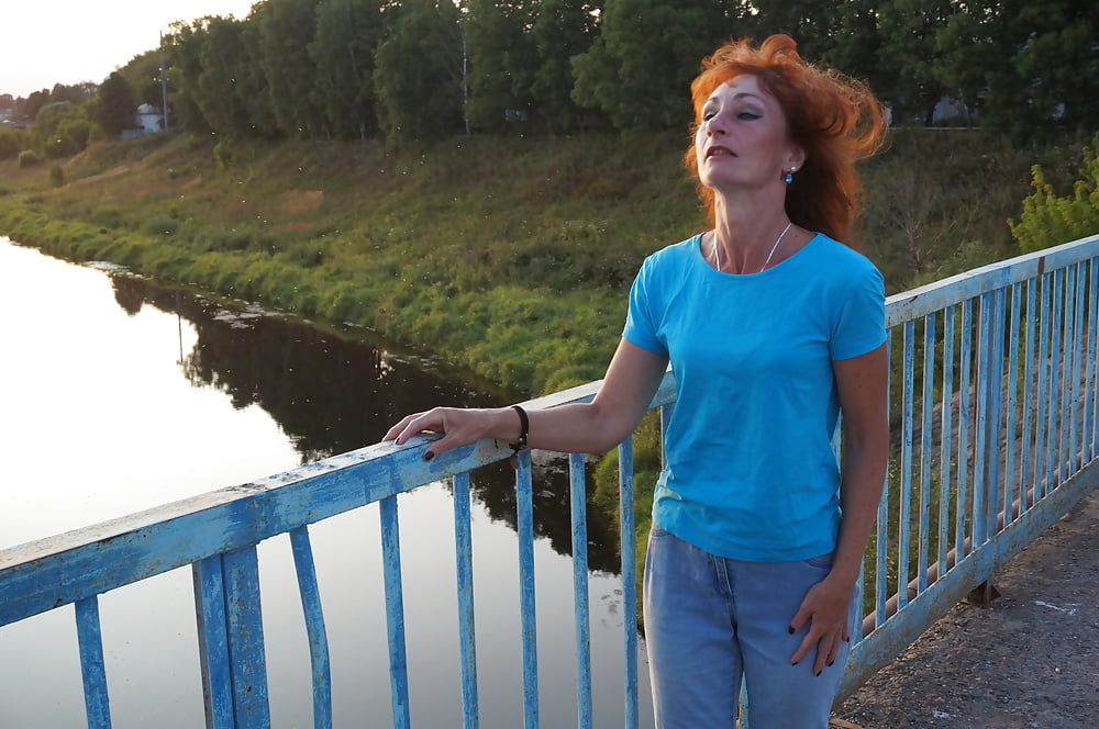 Flamehair in evening on the bridge #107247459