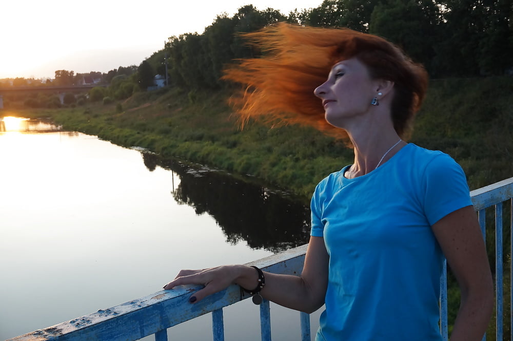 Flamehair in evening on the bridge #107247461