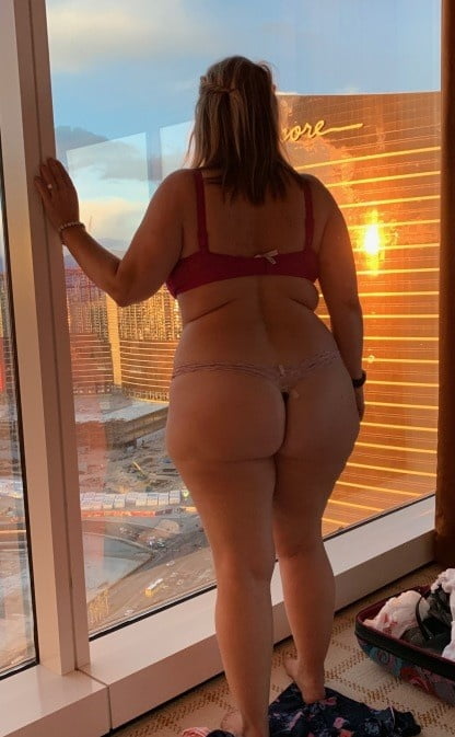 Matures standing in front of window 8 #92933308