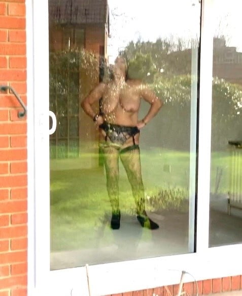 Matures standing in front of window 8 #92933312