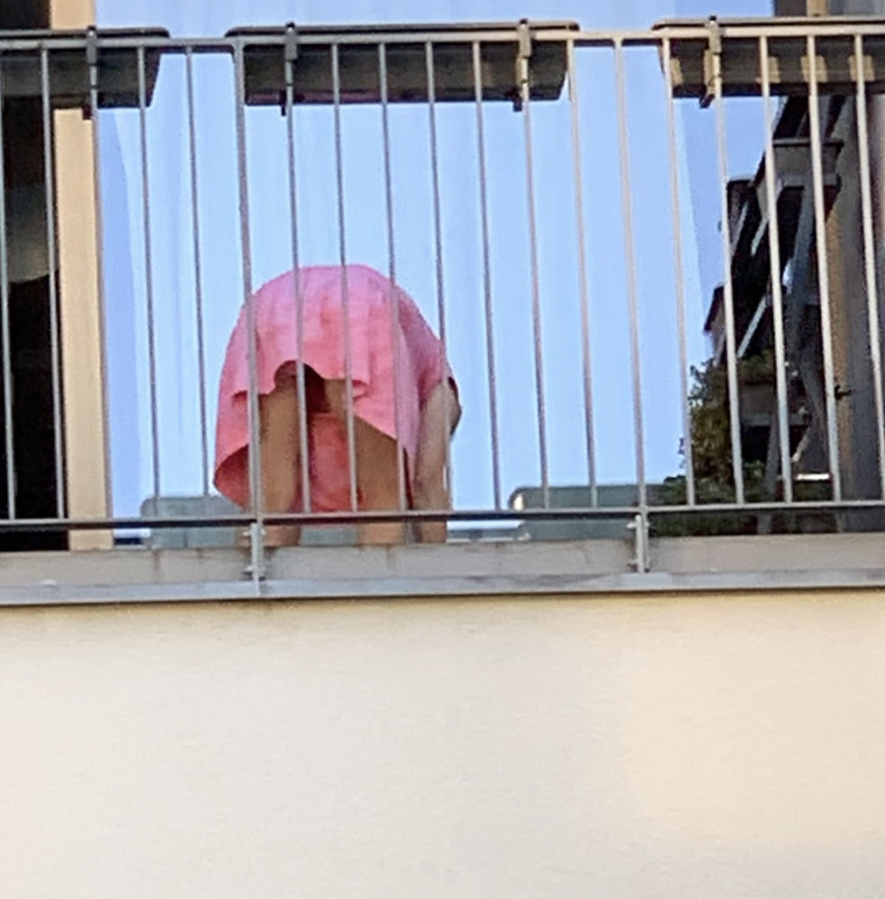 New Neighbour on balcony #86256897