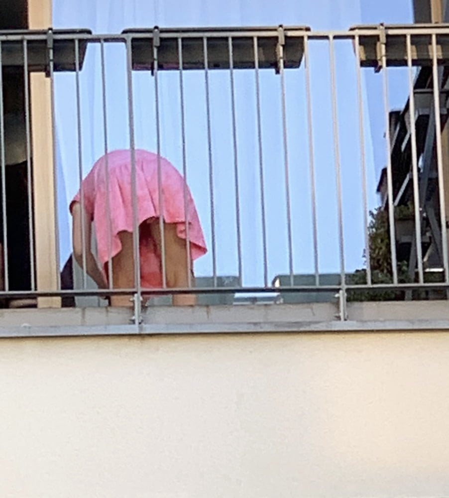 New Neighbour on balcony #86257959