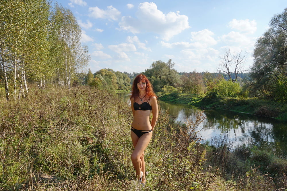 Flame Redhair on River-Beach #107017641