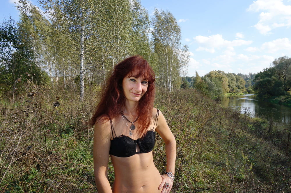 Flame Redhair on River-Beach #107017643