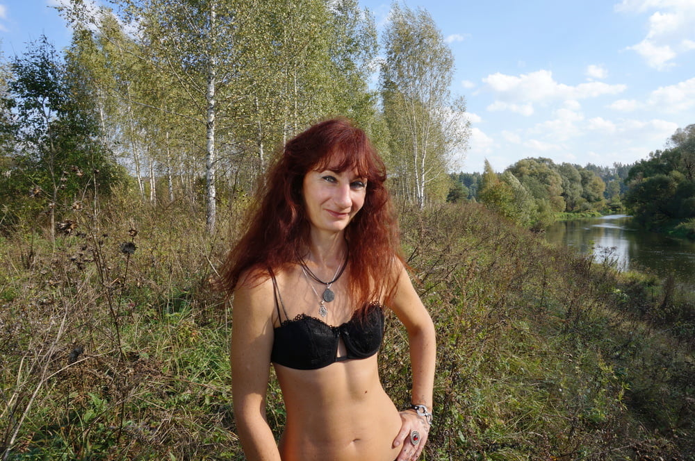 Flame Redhair on River-Beach #107017644