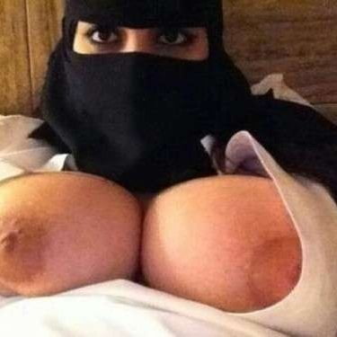Under and behind the naqib or hajib #100894097