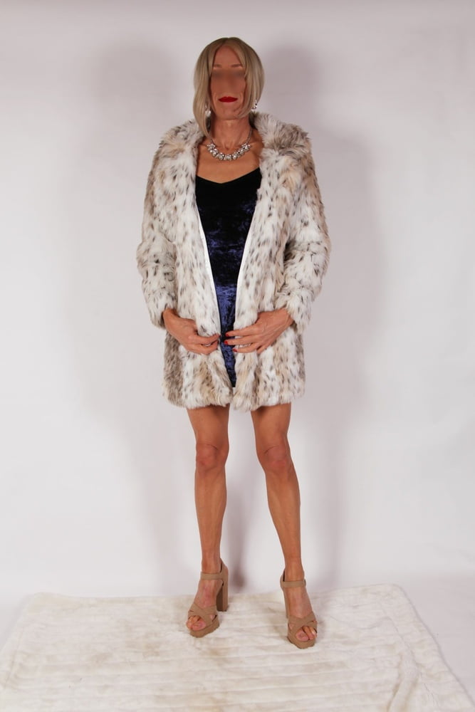 Alessia models slinky velvet blue dress with fur coat #106870807