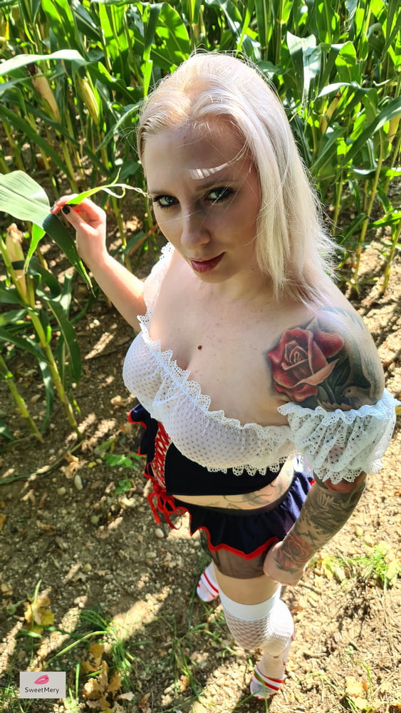 Hot outdoor photo session in a sexy dirndl #106586575