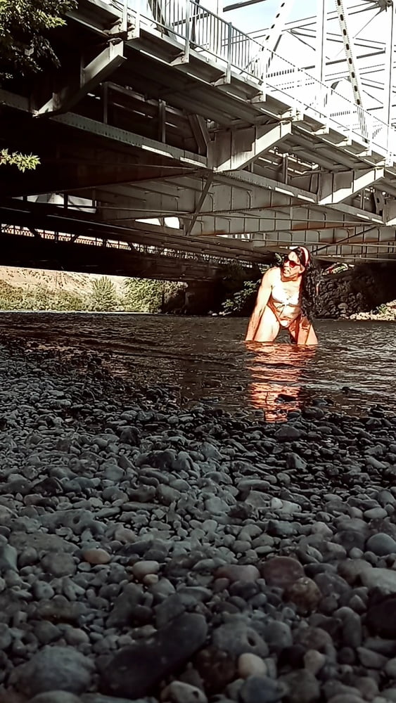 Lexiee playing in the river #106954633