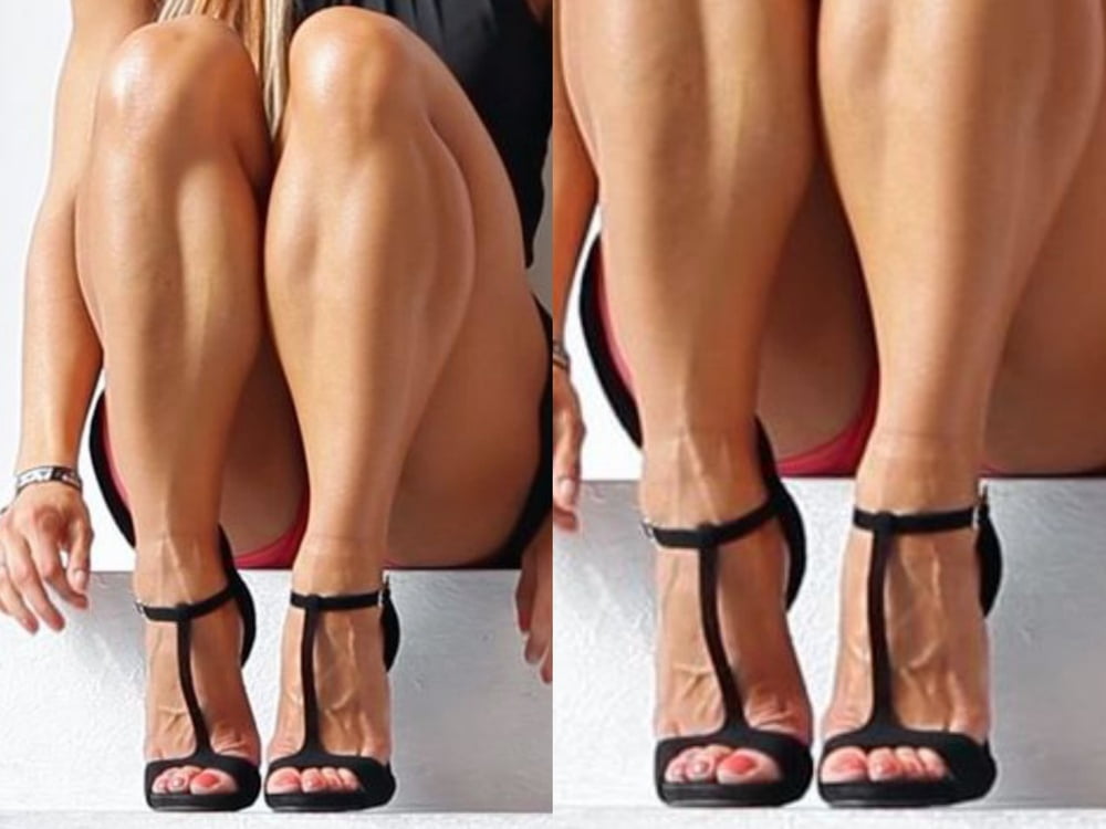 bodybuilder female&#039;s sexy Legs feet and High heels #97106129
