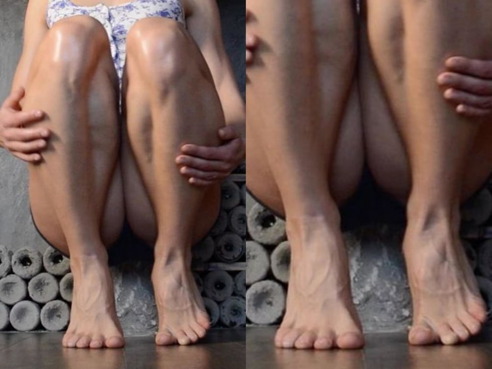 bodybuilder female&#039;s sexy Legs feet and High heels #97106300