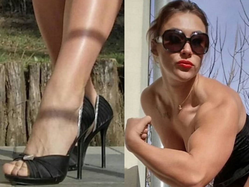 bodybuilder female&#039;s sexy Legs feet and High heels #97106357