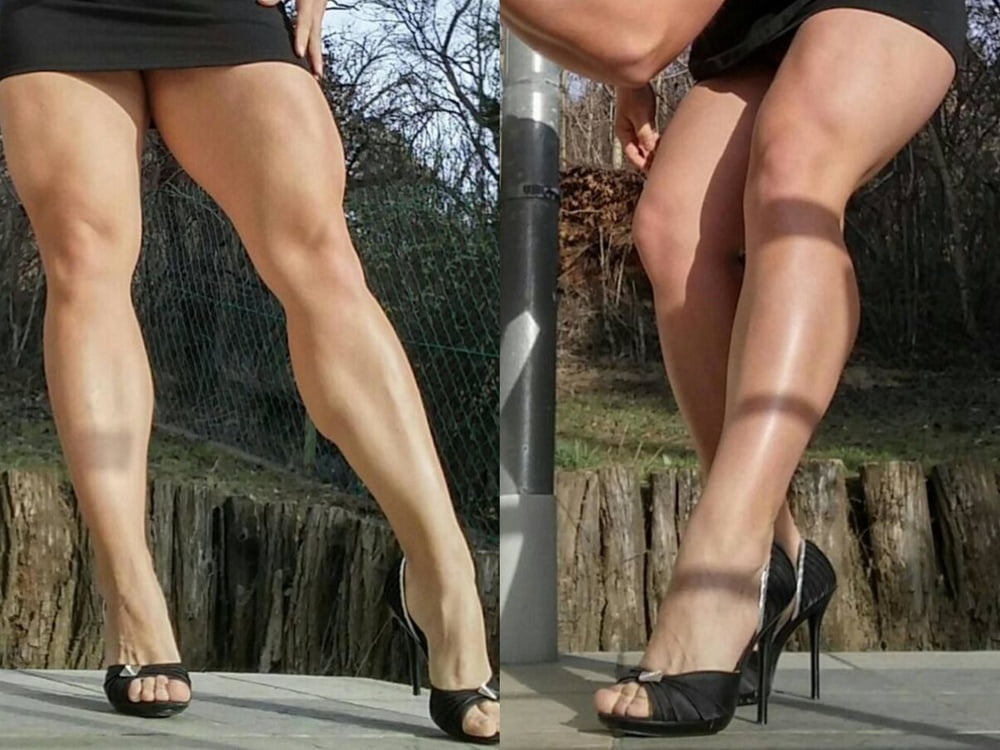 bodybuilder female&#039;s sexy Legs feet and High heels #97106366