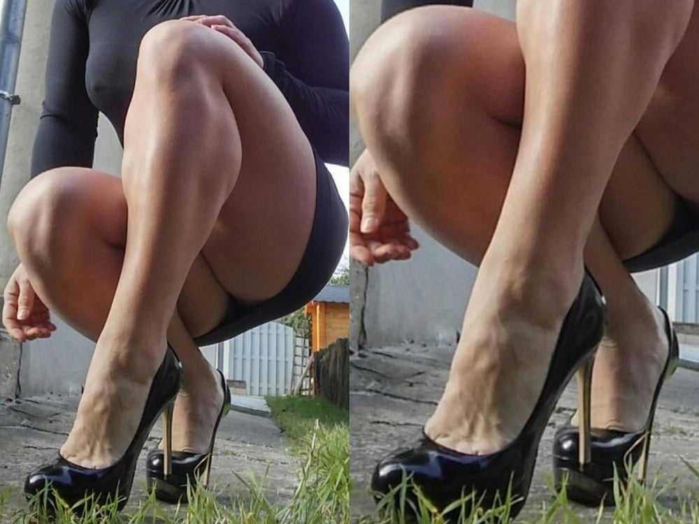 bodybuilder female&#039;s sexy Legs feet and High heels #97106378