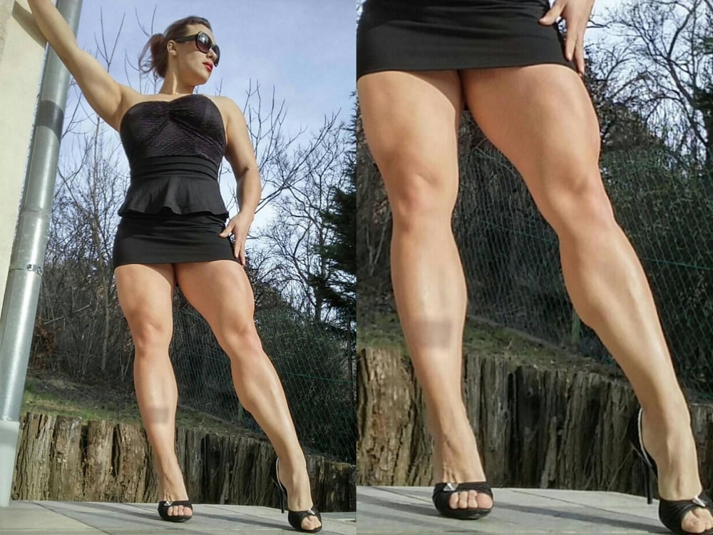 bodybuilder female&#039;s sexy Legs feet and High heels #97106402