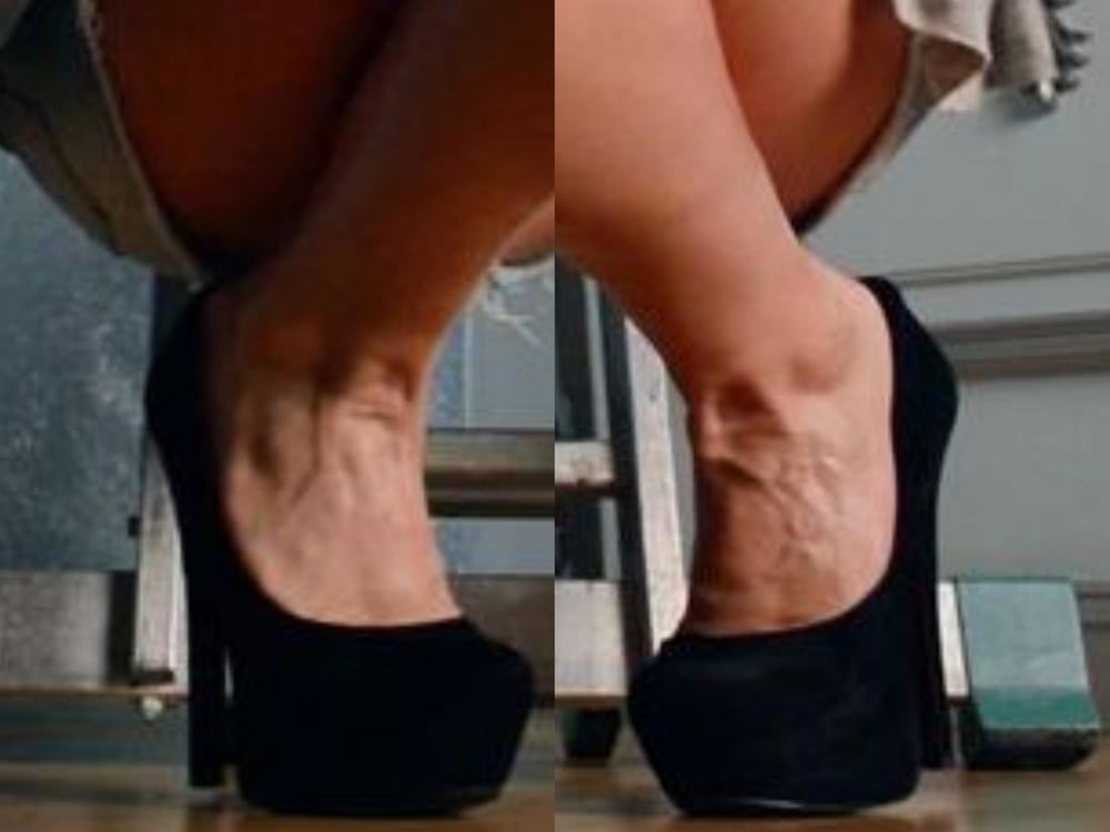 bodybuilder female&#039;s sexy Legs feet and High heels #97106497