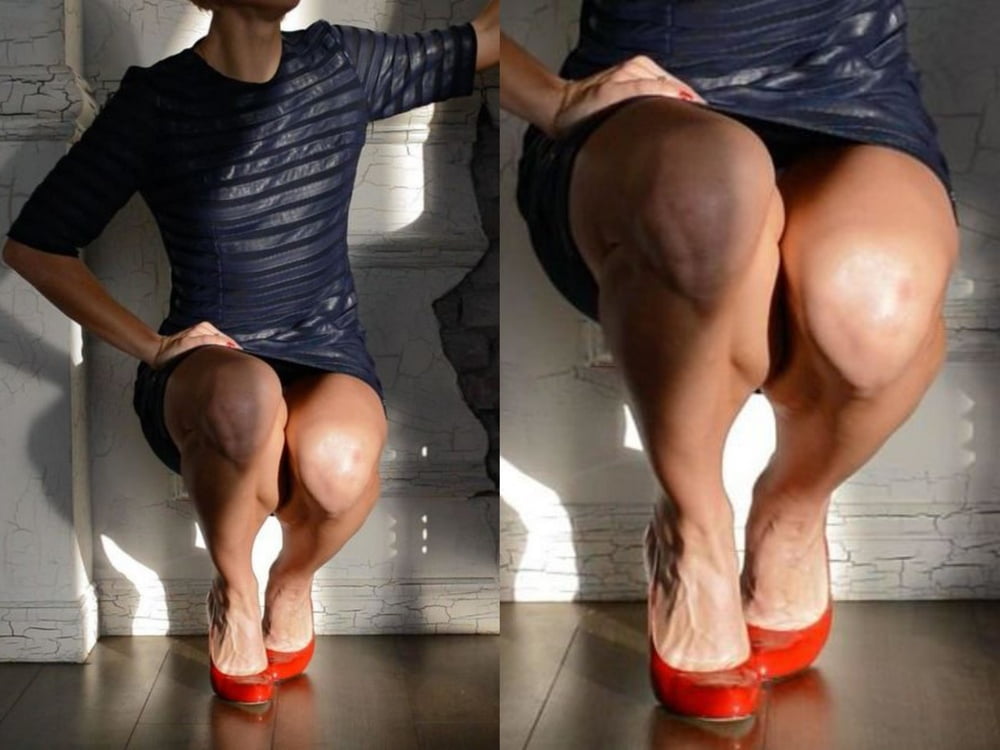 bodybuilder female&#039;s sexy Legs feet and High heels #97106549