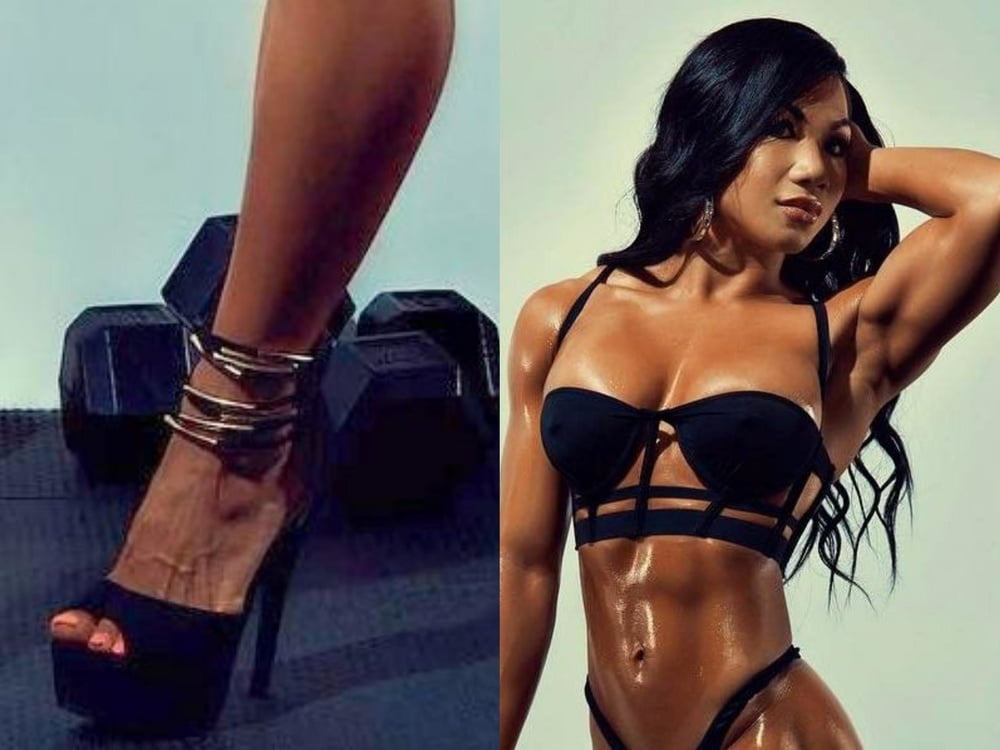 bodybuilder female&#039;s sexy Legs feet and High heels #97106698