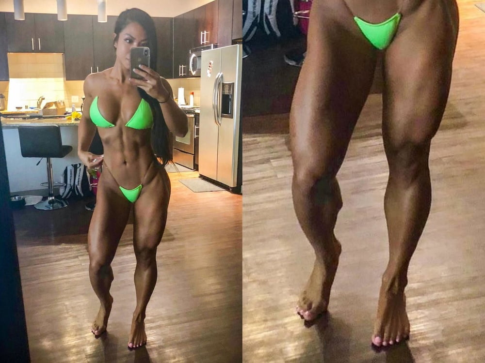 bodybuilder female&#039;s sexy Legs feet and High heels #97106766