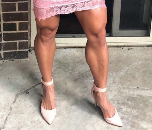 bodybuilder female&#039;s sexy Legs feet and High heels #97106787