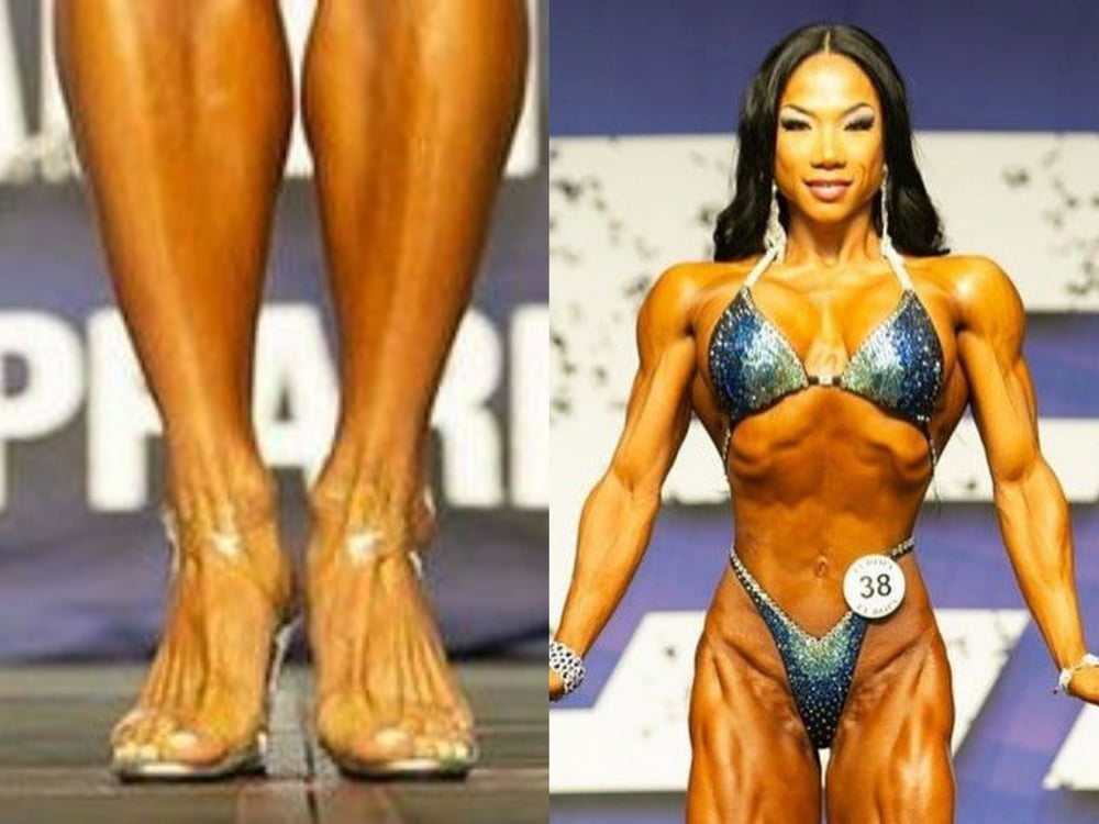 bodybuilder female&#039;s sexy Legs feet and High heels #97106810