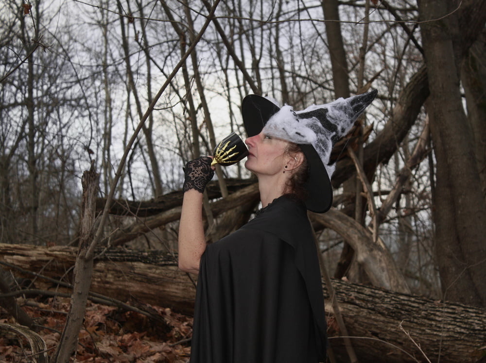 Witch with broom in forest #106868525