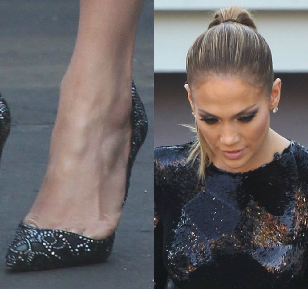 Jennifer lopez sexy beine füße und highheels
 #102514572