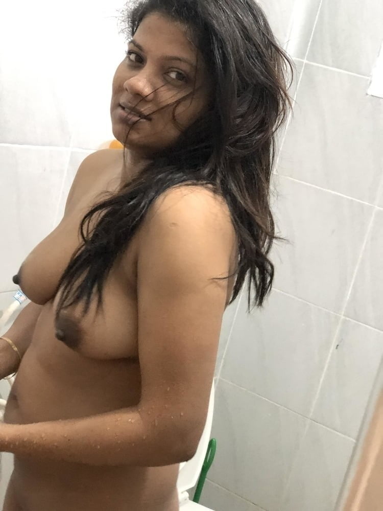 Sri Lankan girl bathing #104333721