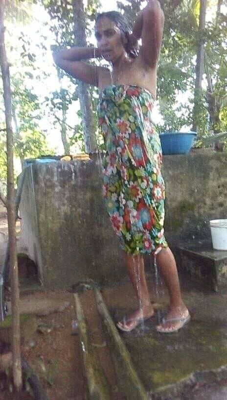 sri lankan wife public bath #104568528