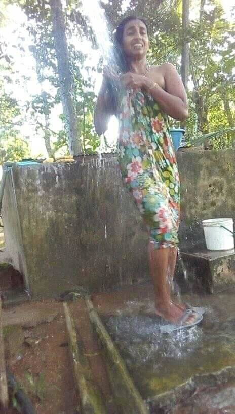sri lankan wife public bath #104568537
