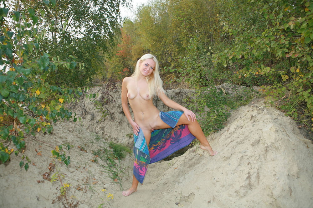 Smiling blue-eyed blonde walks totally naked at public beach #102546281