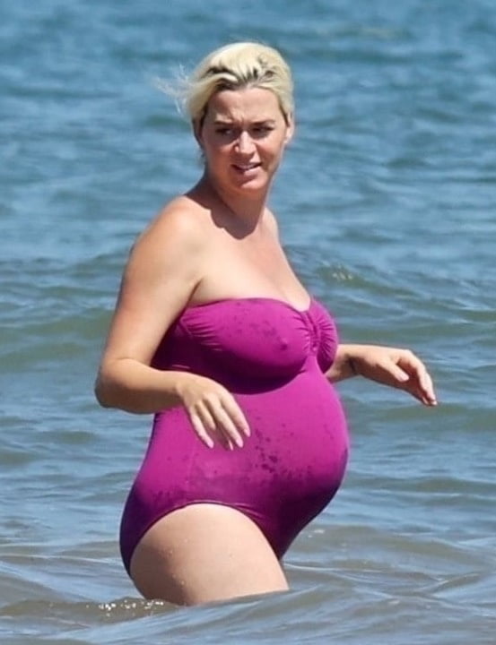 Katy Perry pregnant in a purple swimsuit #90400568