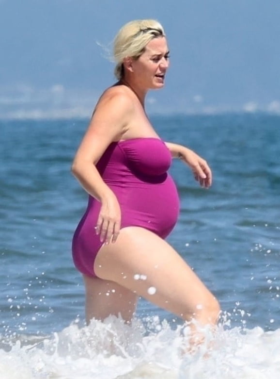 Katy Perry pregnant in a purple swimsuit #90400570