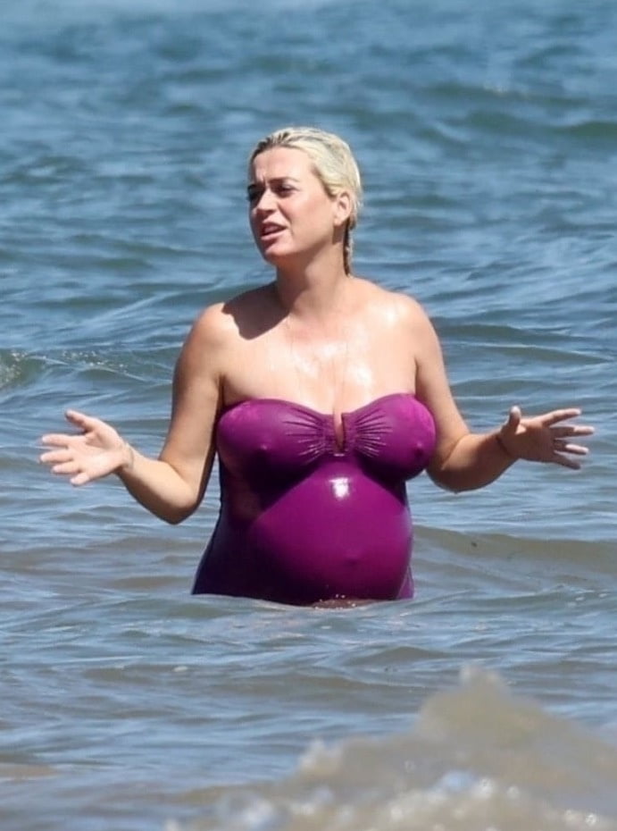 Katy Perry pregnant in a purple swimsuit #90400572