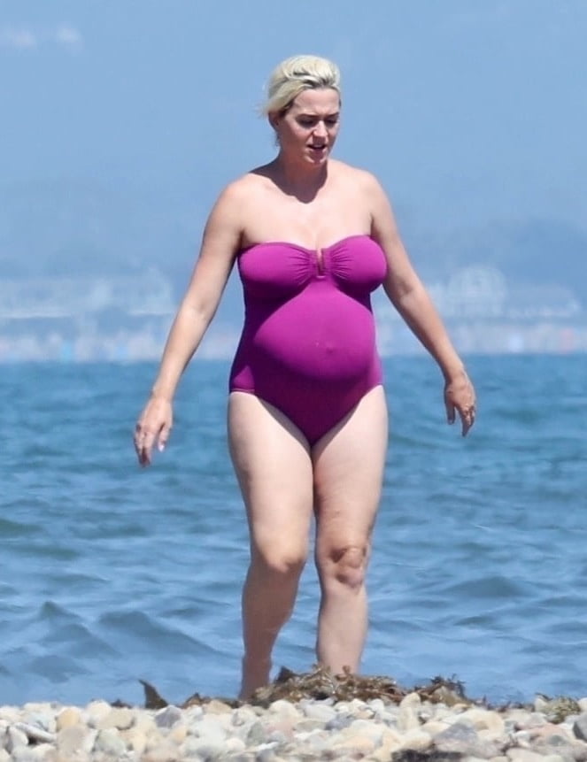 Katy Perry pregnant in a purple swimsuit #90400574