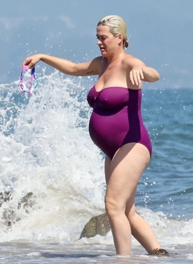 Katy Perry pregnant in a purple swimsuit #90400576